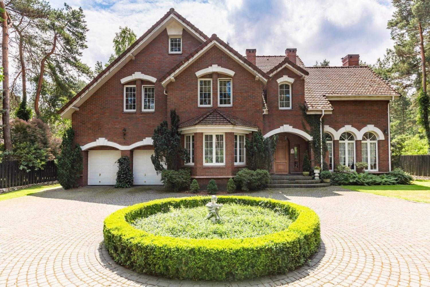 Large brick villa in the UAE with a secure main entrance door